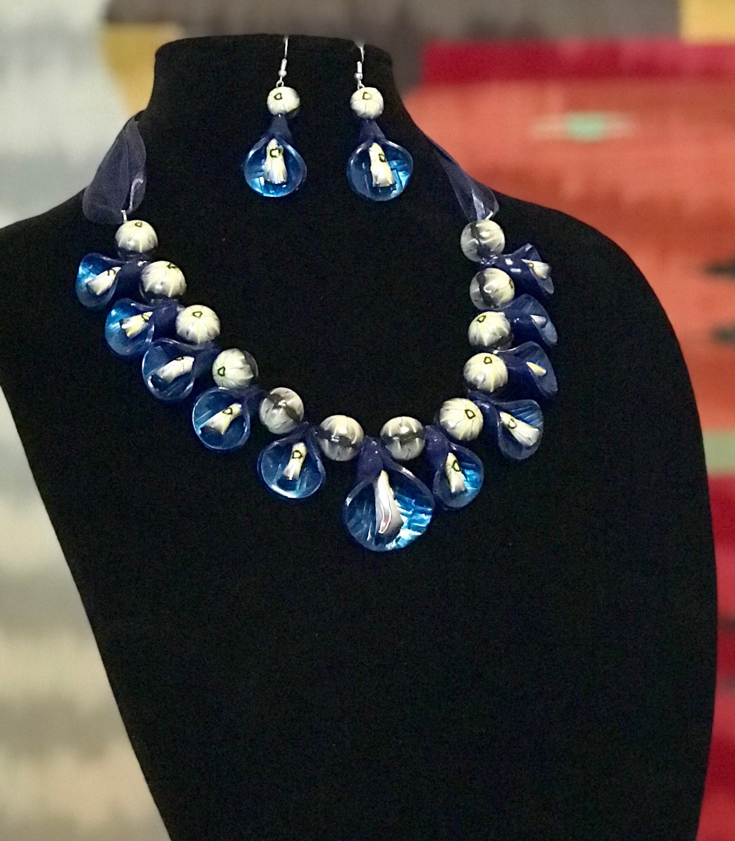 Dark Blue Peddle Necklace and Earring Set with Light Green Accents